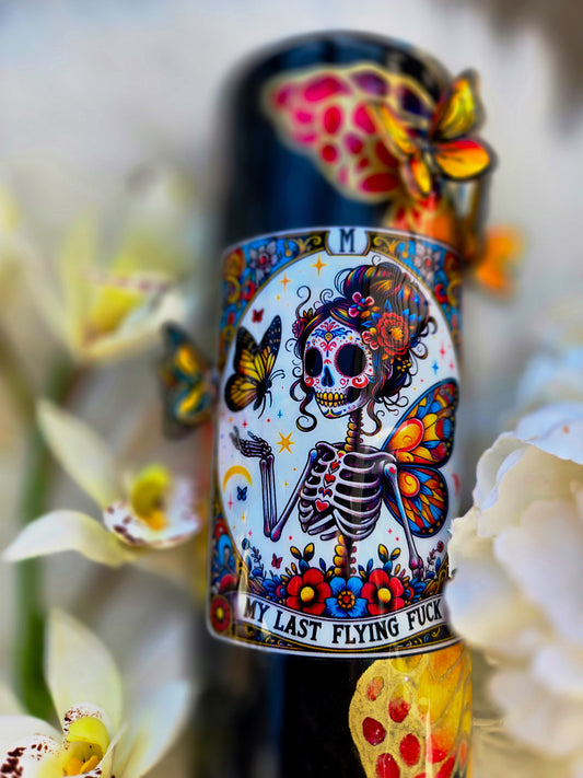 Black tumbler with lady skeleton detail, includes 3d butterflies 
